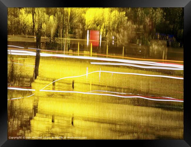Abstract Long Exposure of Rain and Vehicles Framed Print by Iain McLeod