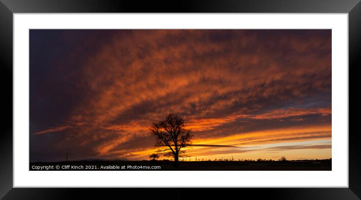 Set the skies alight Framed Mounted Print by Cliff Kinch