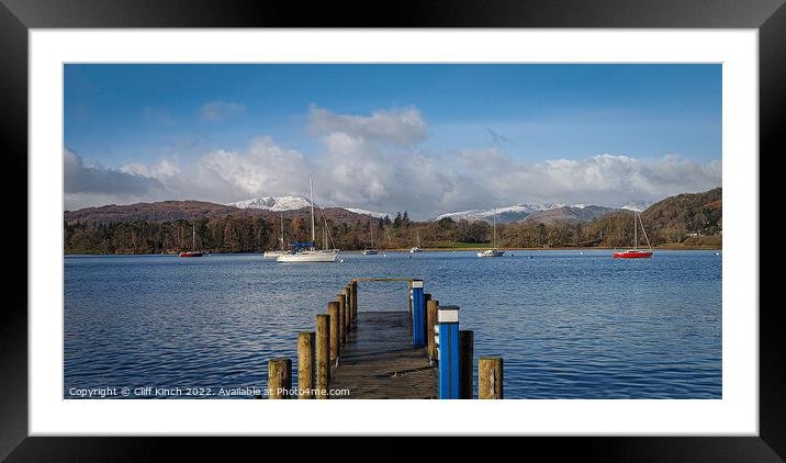 Across Lake Windermere to snow-topped fells Framed Mounted Print by Cliff Kinch