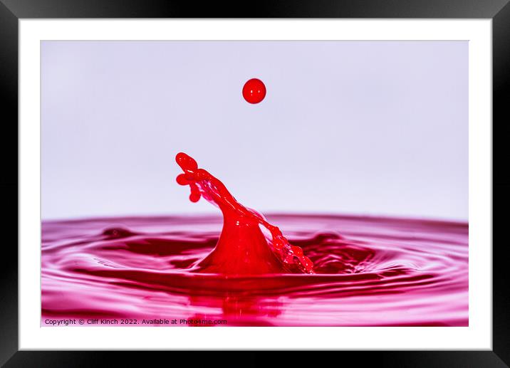 Water drop - Pink Framed Mounted Print by Cliff Kinch