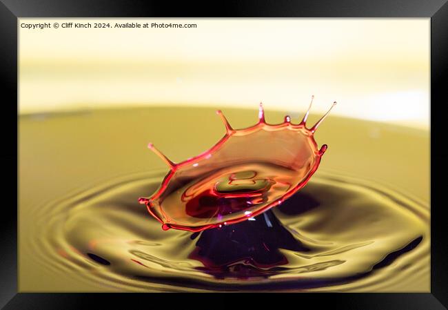 Water drop collision Framed Print by Cliff Kinch