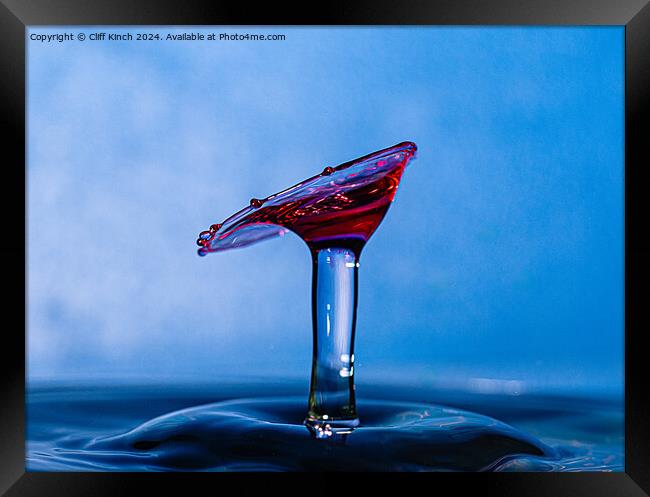 Water drop collision Framed Print by Cliff Kinch