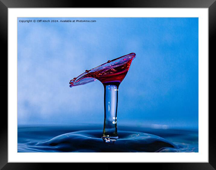 Water drop collision Framed Mounted Print by Cliff Kinch