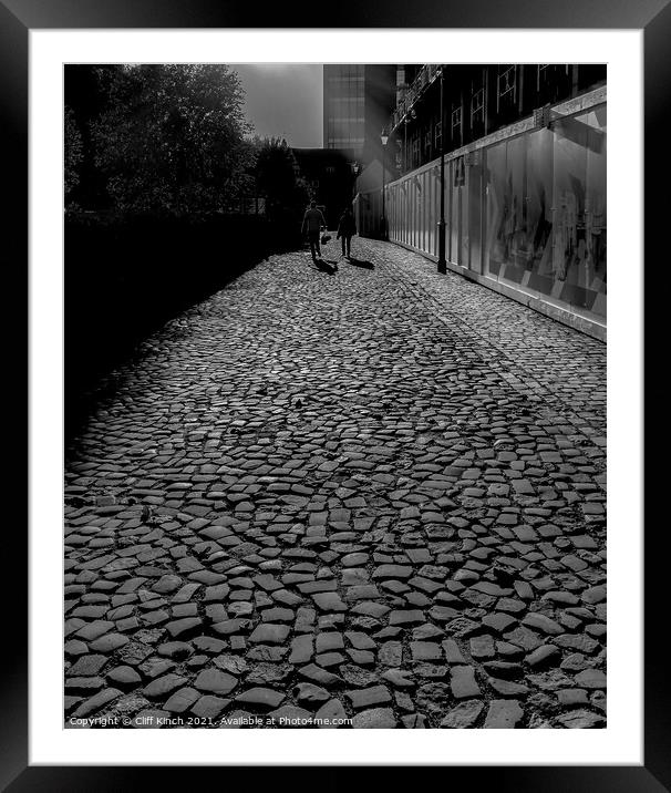 Cobbled walk Framed Mounted Print by Cliff Kinch