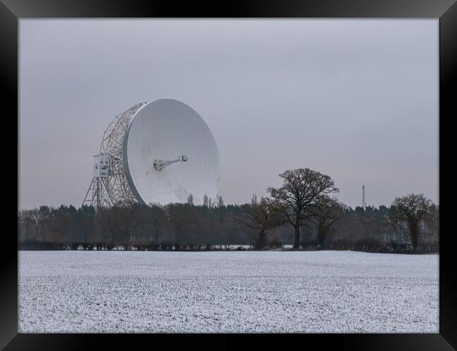 Jodrell Bank in a snow covered field Framed Print by Vicky Outen