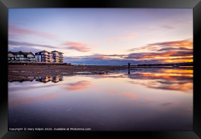 Reflections of sunset over Exmouth Framed Print by Gary Holpin