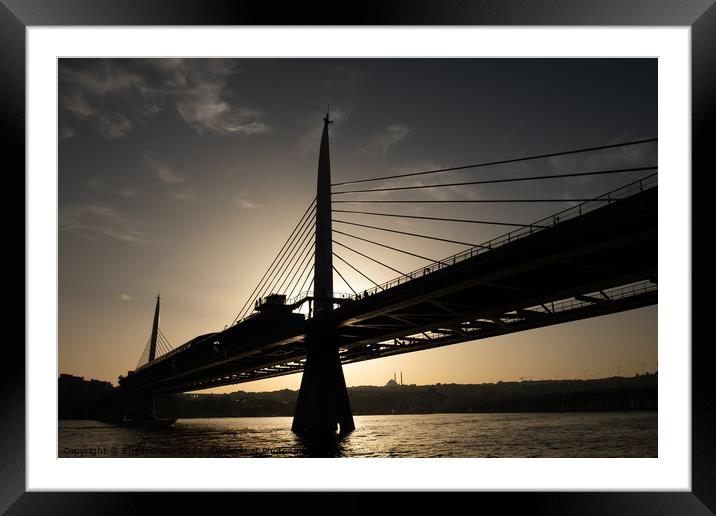 Silhouette of The Metro Bridge at The Golden Horn, Istanbul Framed Mounted Print by Engin Sezer