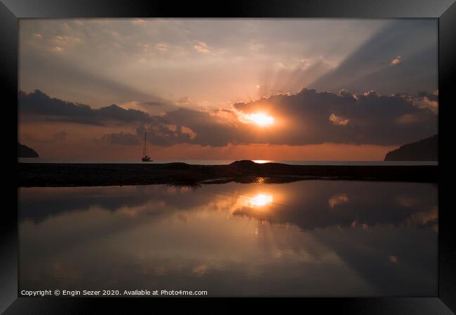 Sunrise and sunbeams at The Beach Of Adrasan at An Framed Print by Engin Sezer