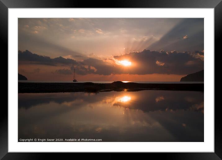 Sunrise and sunbeams at The Beach Of Adrasan at An Framed Mounted Print by Engin Sezer