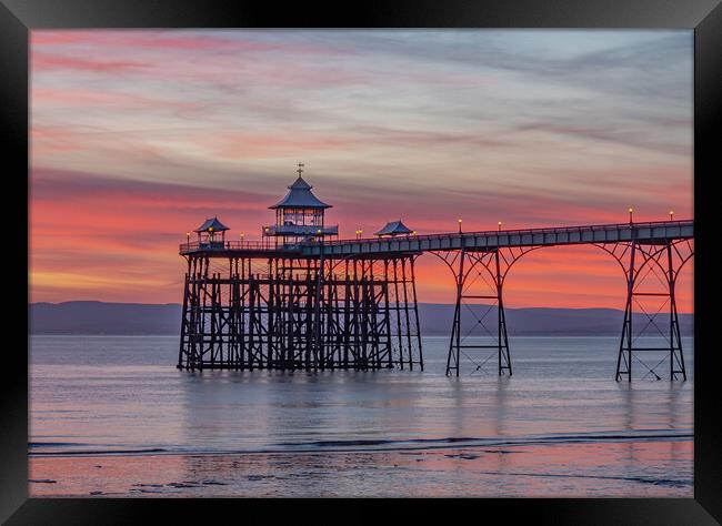 Clevedon Pier at low tide Framed Print by Rory Hailes