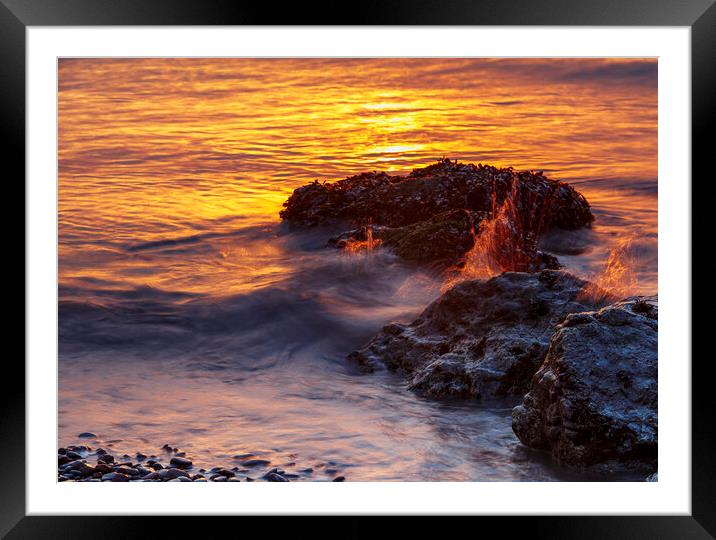Sunset rocks with a splash Framed Mounted Print by Rory Hailes