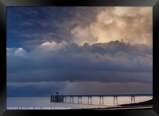 Clevedon Pier on a stormy evening Framed Print by Rory Hailes