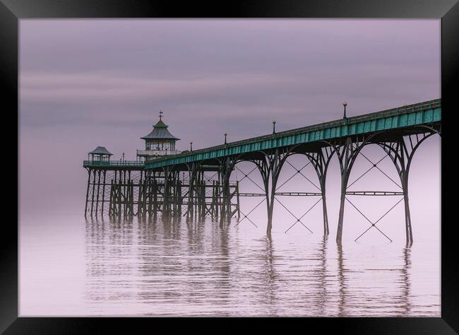 Clevedon Pier on a calm and misty morning Framed Print by Rory Hailes
