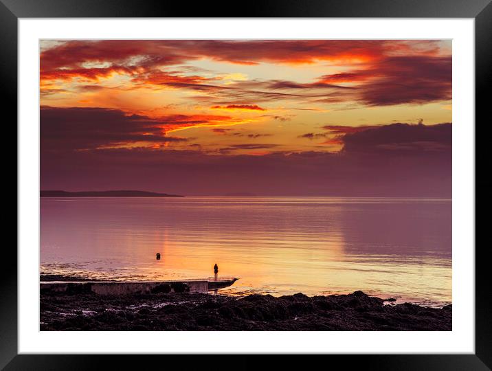 Looking out to sea at a colourful sunset Framed Mounted Print by Rory Hailes