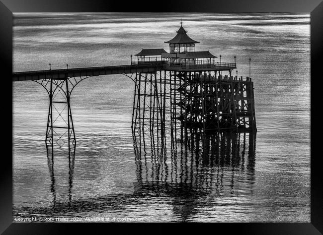 Clevedon Pier at sunset on a calm and tranquil evening Framed Print by Rory Hailes