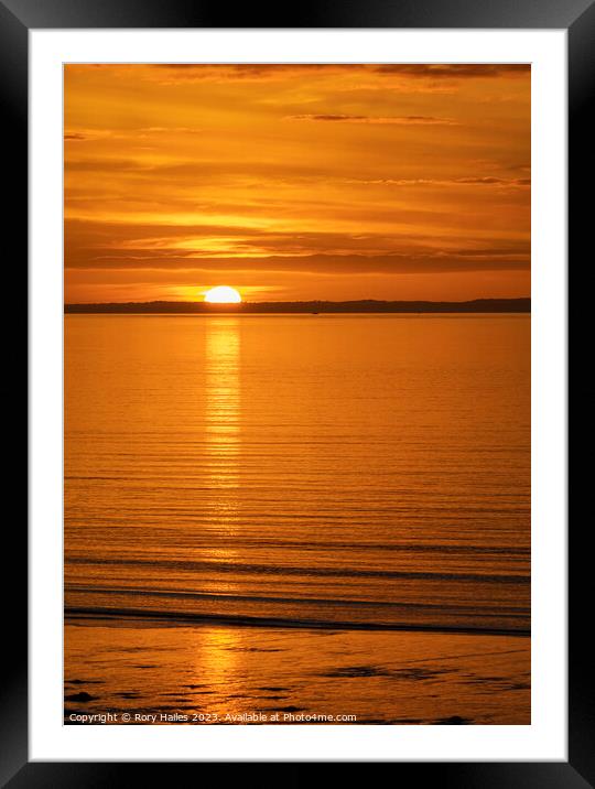 The sun setting over the Welsh coast Framed Mounted Print by Rory Hailes