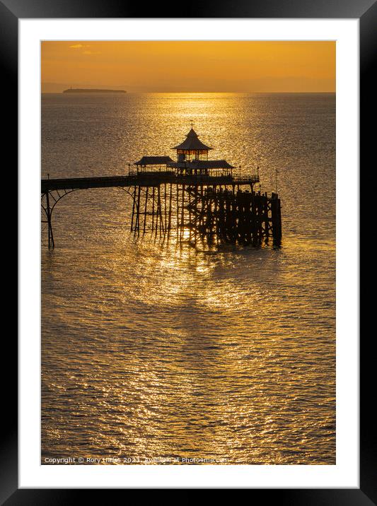 Clevedon Pier at sunset with a calm sea Framed Mounted Print by Rory Hailes