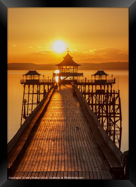 Clevedon Pier with a golden reflection Framed Print by Rory Hailes