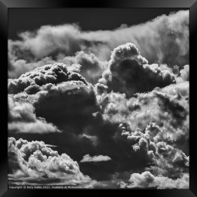 Fluffy clouds in the sky Framed Print by Rory Hailes
