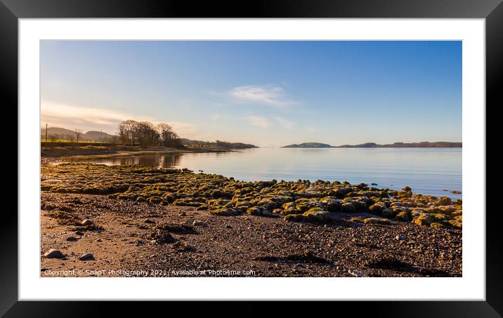 Sunrise on a rocky beach at Kirkcudbright Bay, Dumfries and Galloway, Scotland Framed Mounted Print by SnapT Photography