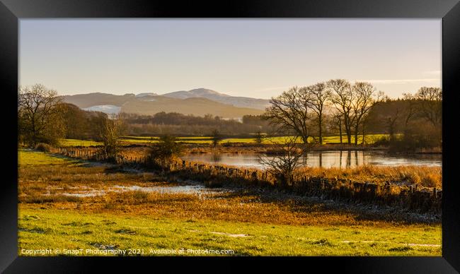 The River Dee in winter with a snow covered Bengairn Hill in the Framed Print by SnapT Photography