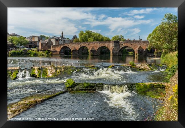 The River Nith flowing over the Caul weir in Dumfries, during summer in Scotland Framed Print by SnapT Photography