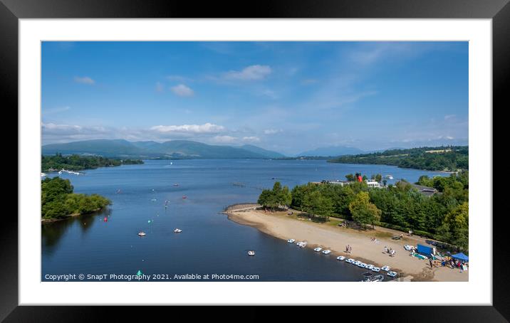 View over Loch Lomond from Lomond shores on a sunny summer day in Scotland Framed Mounted Print by SnapT Photography
