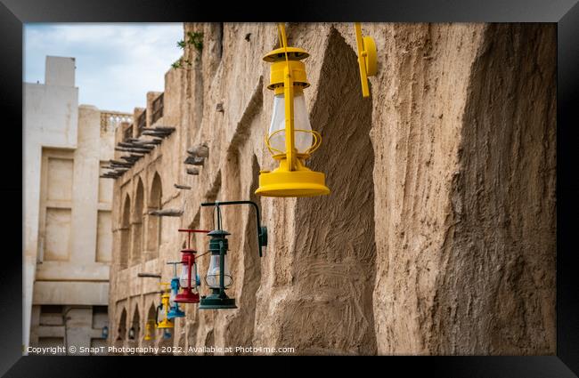 Colored lanterns hanging in old town Souq Waqif, Doha, Qatar Framed Print by SnapT Photography