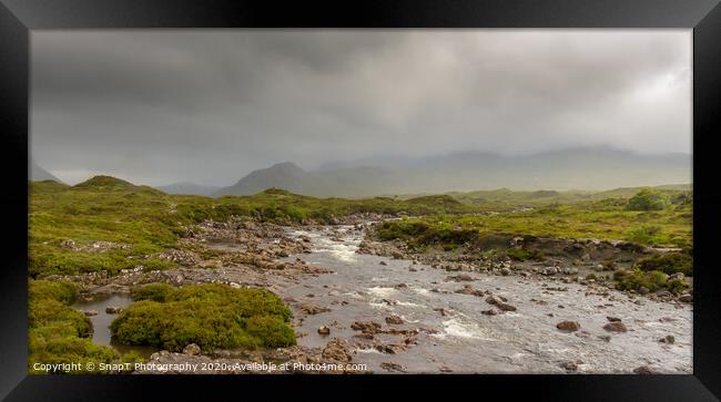 A fast flowing Scottish Highland river on a stormy day in the Isle of Skye Framed Print by SnapT Photography