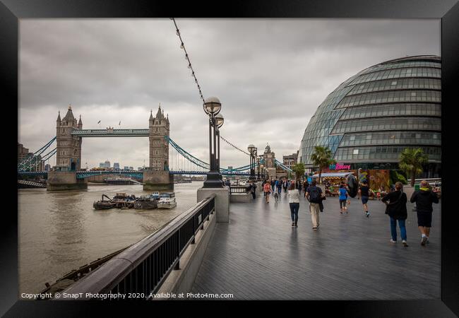 City Hall and Tower Bridge by the Thames, on a cloudy summer afternoon in London Framed Print by SnapT Photography