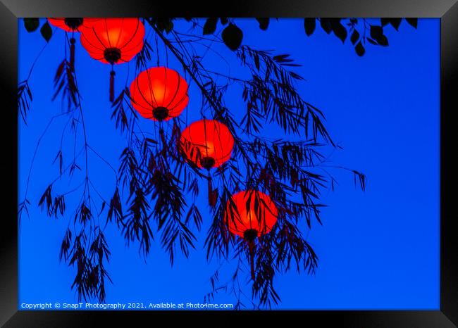 Red vietnamese or chinese lanterns contrasting with a blue sky Framed Print by SnapT Photography