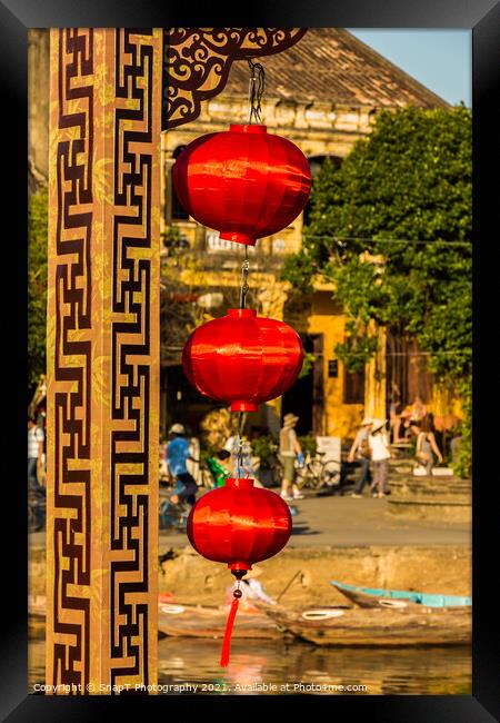 Three red vietnamese or chinese lanterns hanging in Hoi An, Vietnam Framed Print by SnapT Photography