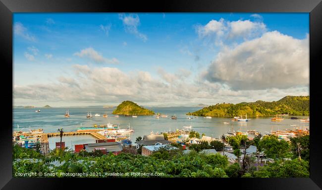A view over the town of Labuan Bajo and harbour in the morning, Indonesia Framed Print by SnapT Photography