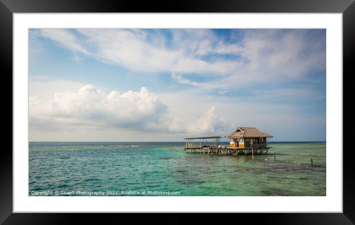 A stilt house on the tropical island of Pramuka, Thousand Islands, Indonesia Framed Mounted Print by SnapT Photography
