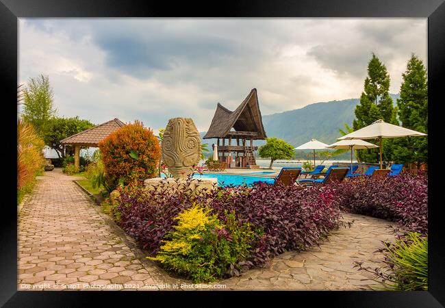 A Bataknese villa on the shore of Lake Toba, North Sumatra, Indonesia Framed Print by SnapT Photography