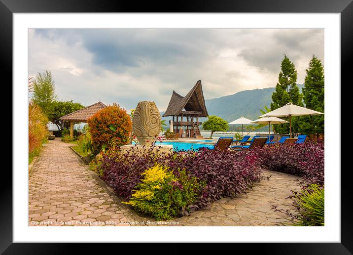 A Bataknese villa on the shore of Lake Toba, North Sumatra, Indonesia Framed Mounted Print by SnapT Photography