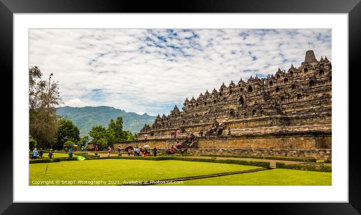 A line of tourists ascending the stairs on the Borobudur Buddhist temple, Indonesia Framed Mounted Print by SnapT Photography