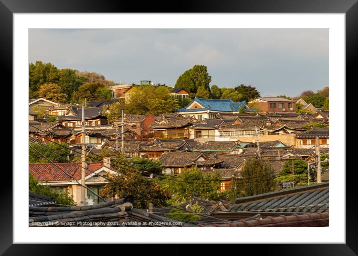 The Korean architechture in the roof tops of Bukchon Hanok Village in Seoul Framed Mounted Print by SnapT Photography