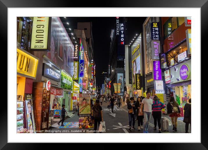 Myeongdong Shopping District at night in Seoul, South Korea Framed Mounted Print by SnapT Photography