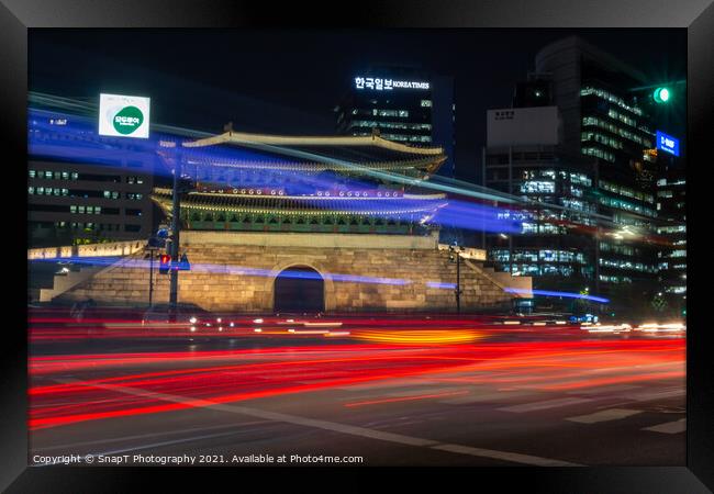 Long exposure of the traffic on the road at Sungnyemun Gate at night in Seoul Framed Print by SnapT Photography