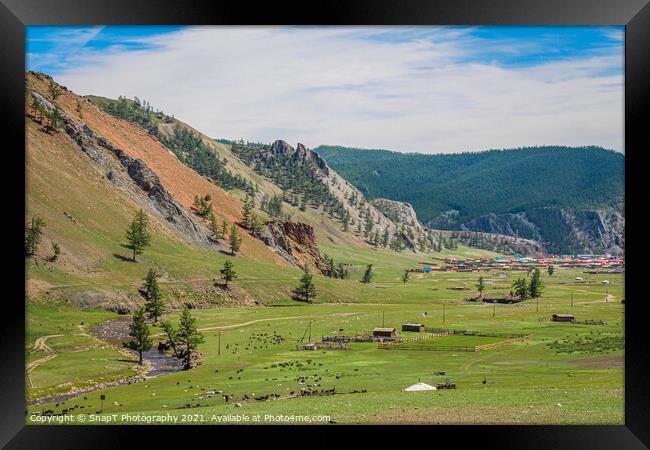 A view down a river valley, with the town of Altraga in the distance, Mongolia Framed Print by SnapT Photography