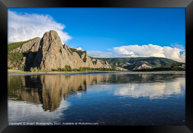 A mountain reflecting on the Delger Murun River in Mongolia in the evening sun Framed Print by SnapT Photography