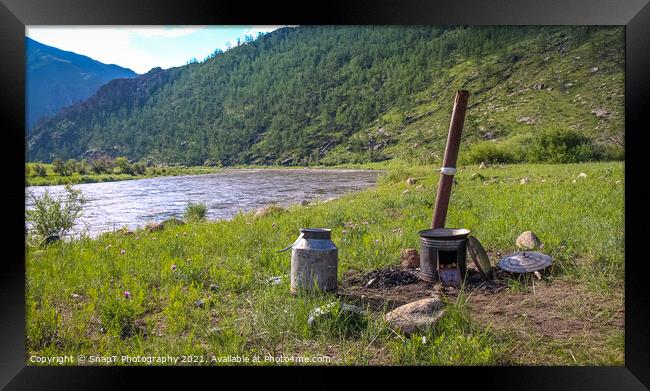 A traditional Mongolian camp cooker and chimney, beside a river Framed Print by SnapT Photography