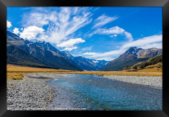 The upper Ahuriri River on a sunny day, surrounded by snow capped mountains Framed Print by SnapT Photography