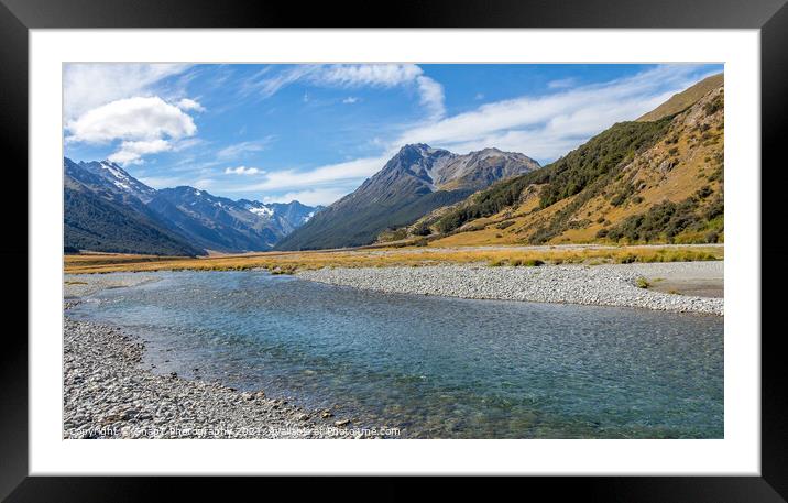 A shallow, fast flowing river, in the mountains of New Zealand on a sunny day Framed Mounted Print by SnapT Photography