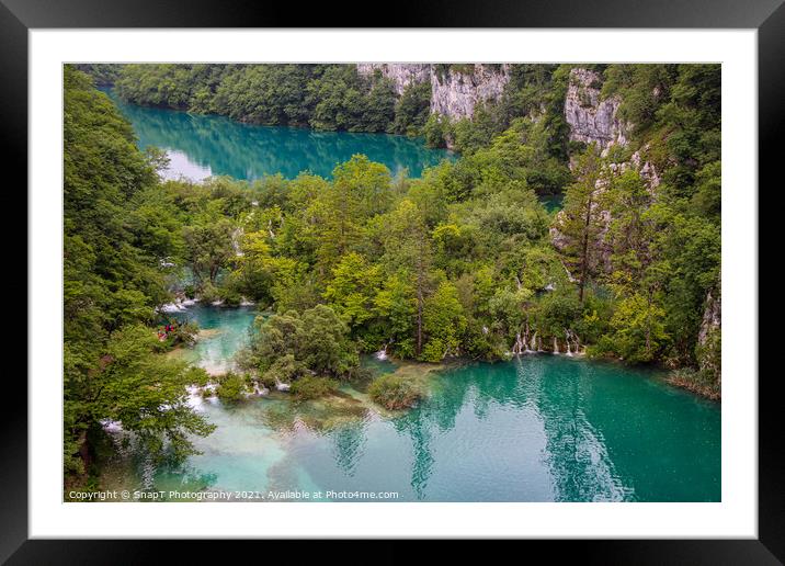 Water flowing through submerged trees between two lakes at Plitvice Lakes Framed Mounted Print by SnapT Photography