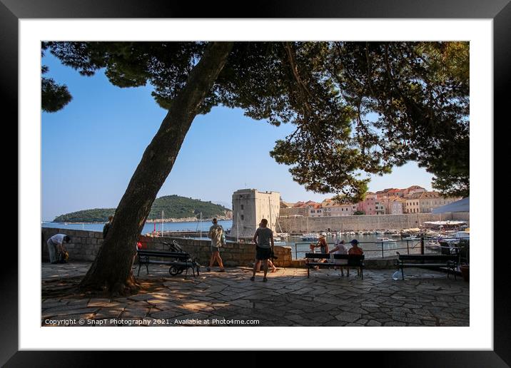 Tourists viewing the harbour and old town in Dubrovnik, Croatia Framed Mounted Print by SnapT Photography