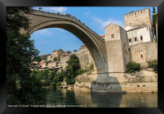 Close up of the historic arched Old Bridge of Mostar on the Neretva River Framed Print by SnapT Photography