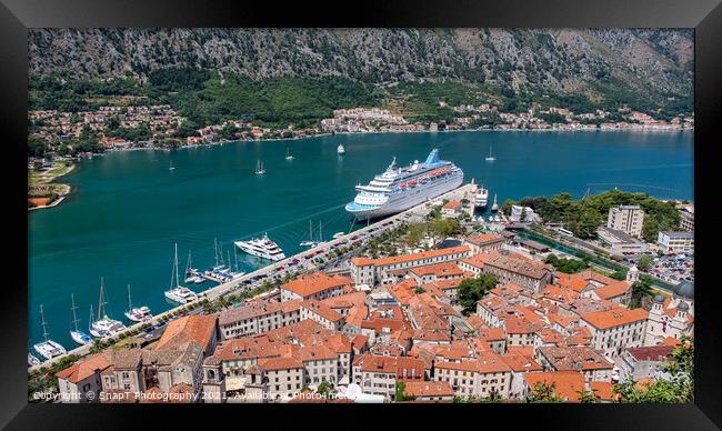 A cruise ship moored at the UNESCO World Heritage Site of the Old Town of Kotor Framed Print by SnapT Photography