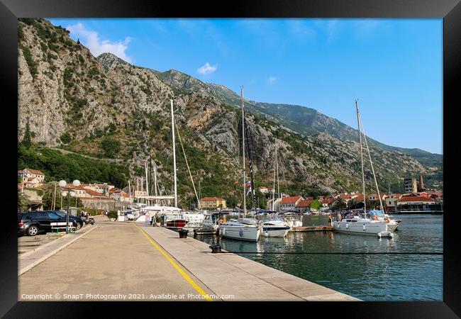Luxury yachts moored at the harbour in the Old Town of Kotor, Montenegro Framed Print by SnapT Photography